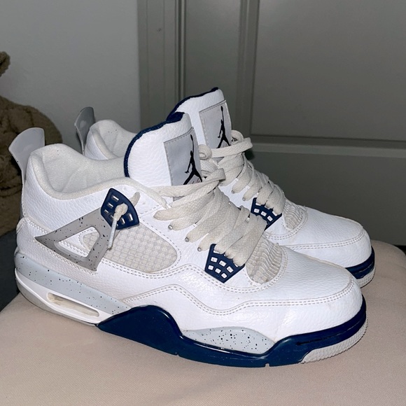 White and royal blue Jordan 4s